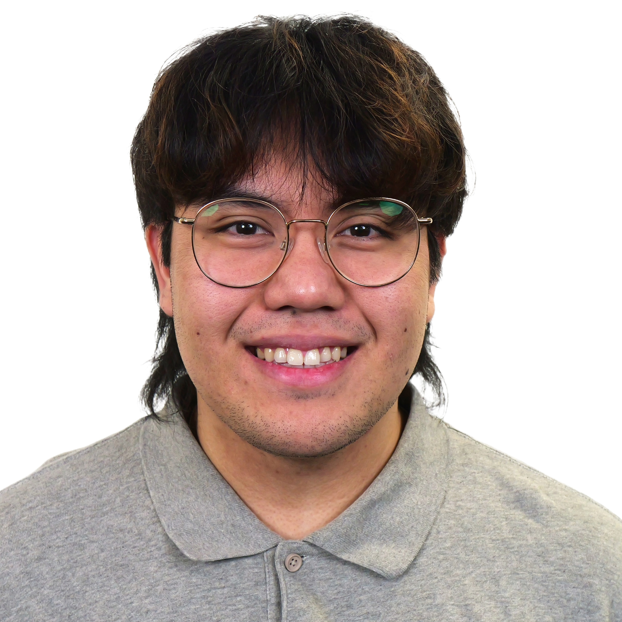 Francis Jr Asigurado (TMS) smiling in a white background.