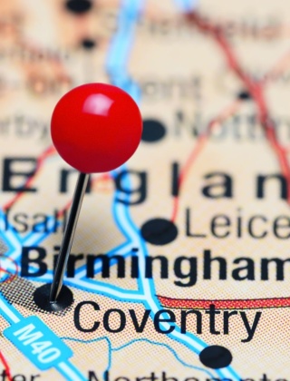 A close up map of the UK with a pin on Birmingham.
