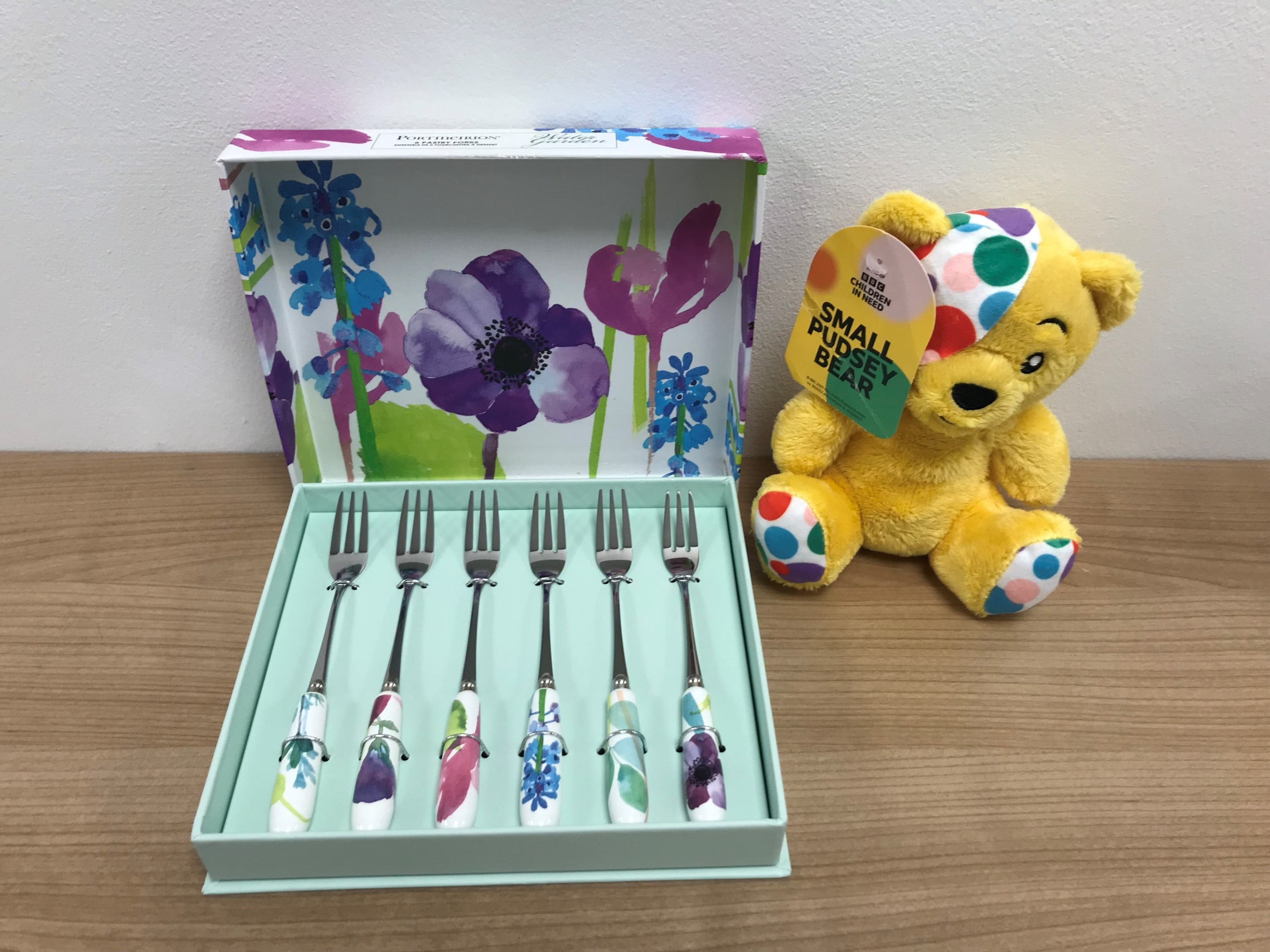 Pudsey bear plushie and pastry forks