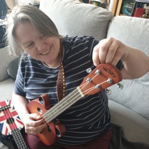 Fiona Taylor (TMS) tuning a ukulele.