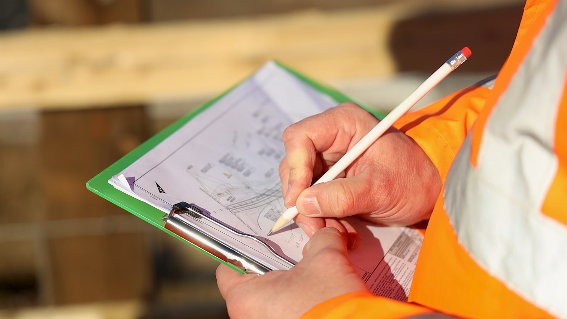 Lee Williams (TMS) making notes in a drawing plan