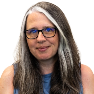 Vicky Seaton (TMS) smiling in a white background.