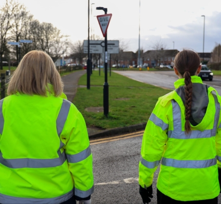 Tara Jowett (TMS) and Amelia Hill (TMS) looking at a road.