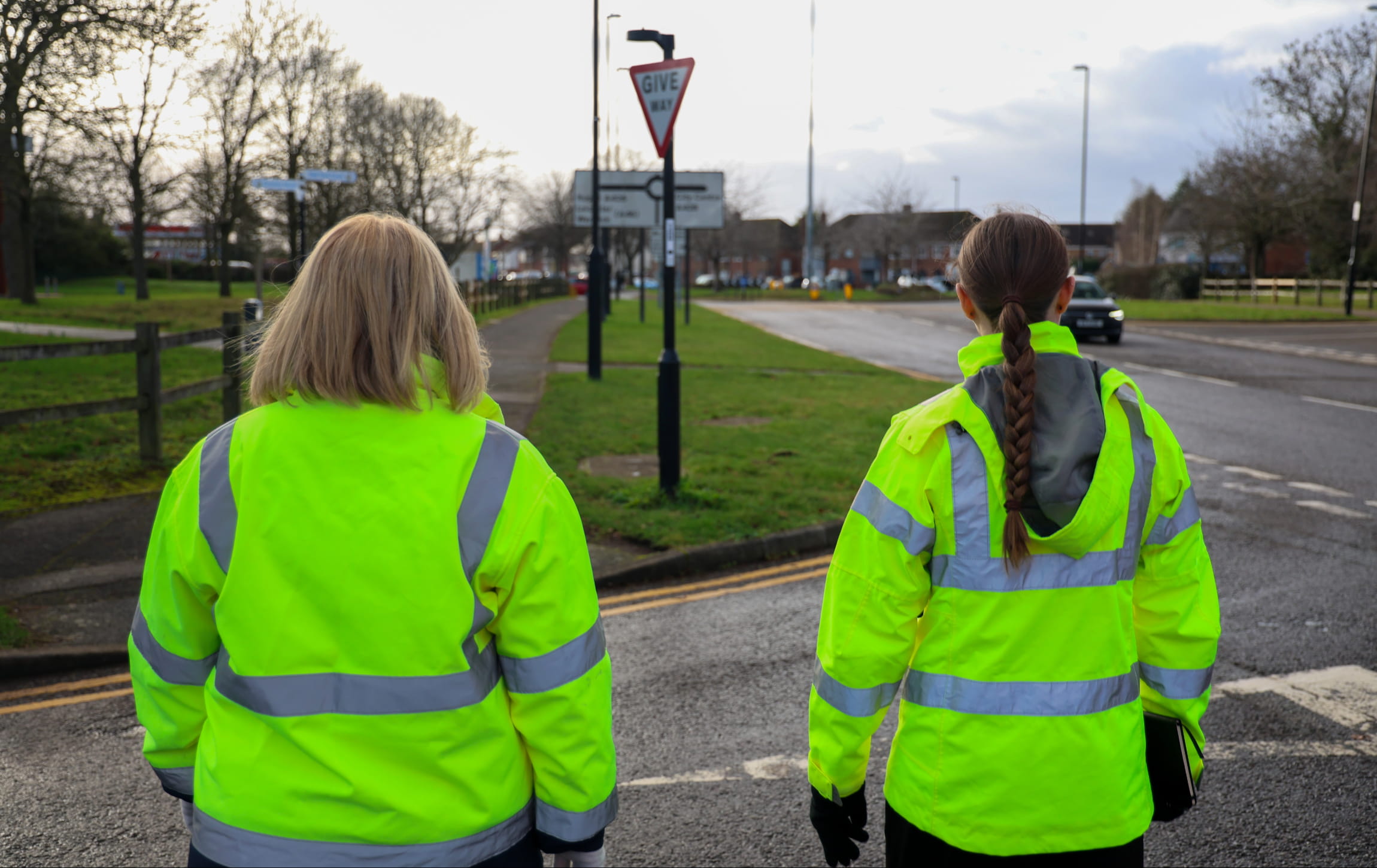 Tara Jowett (TMS) and Amelia Hill (TMS) looking at a road.